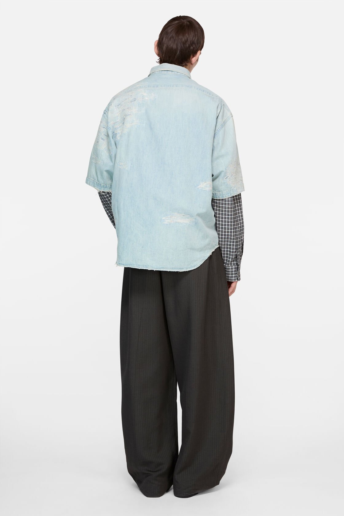 Reparerad denimshirt