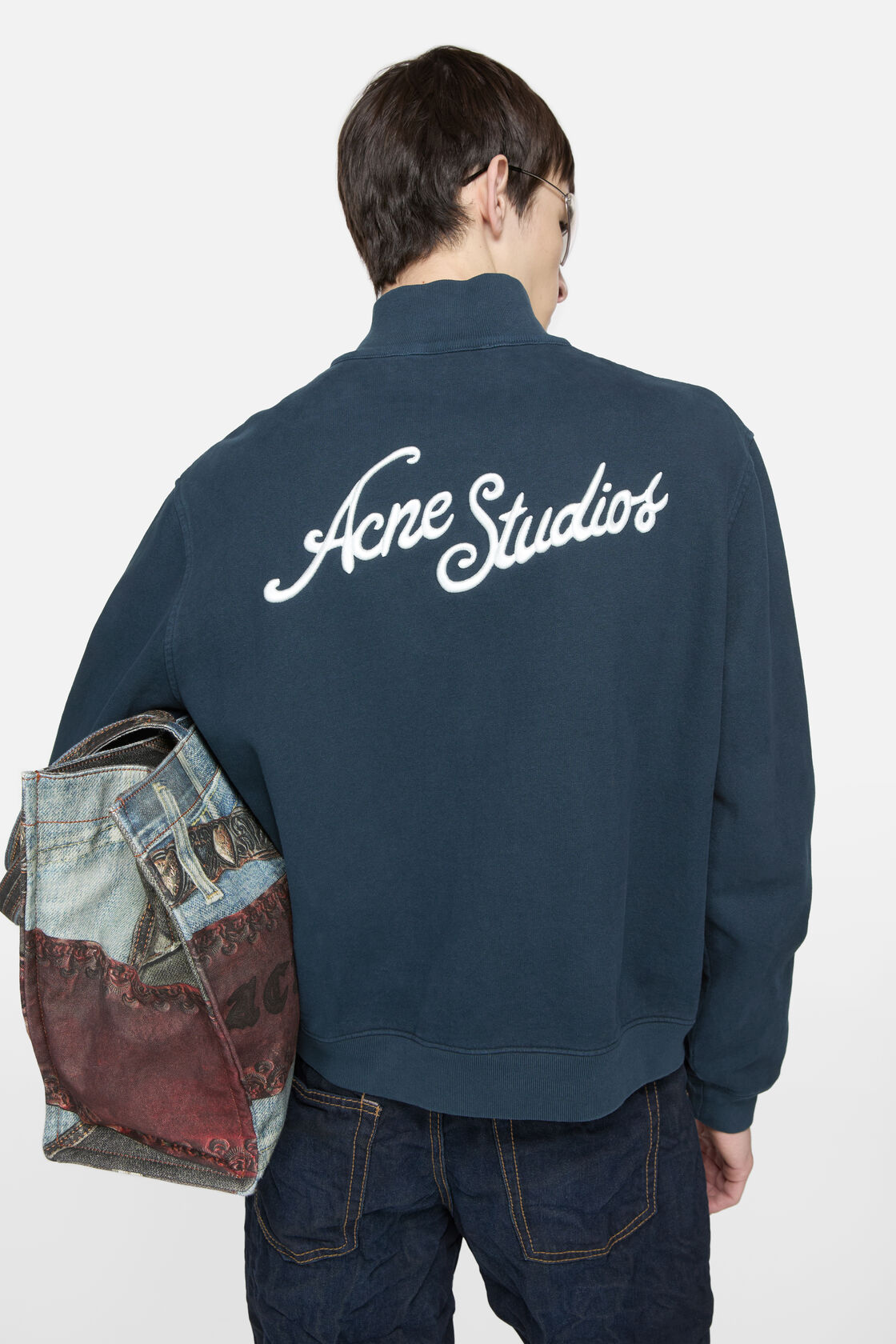 Broderad logotyp zip-kappa