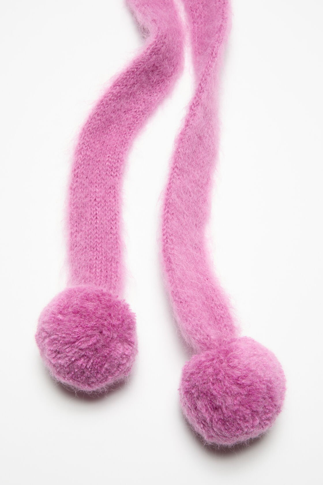 Mohairmössa med öronpluggar