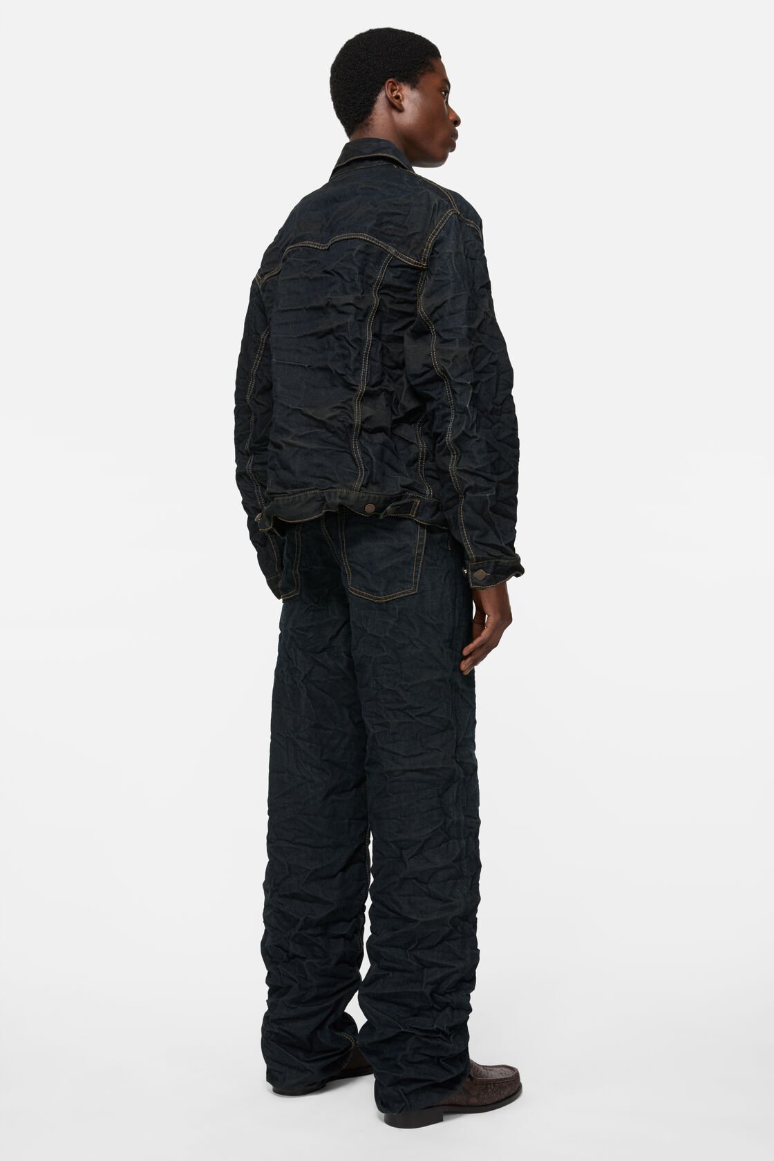 Flikkad denimjacka